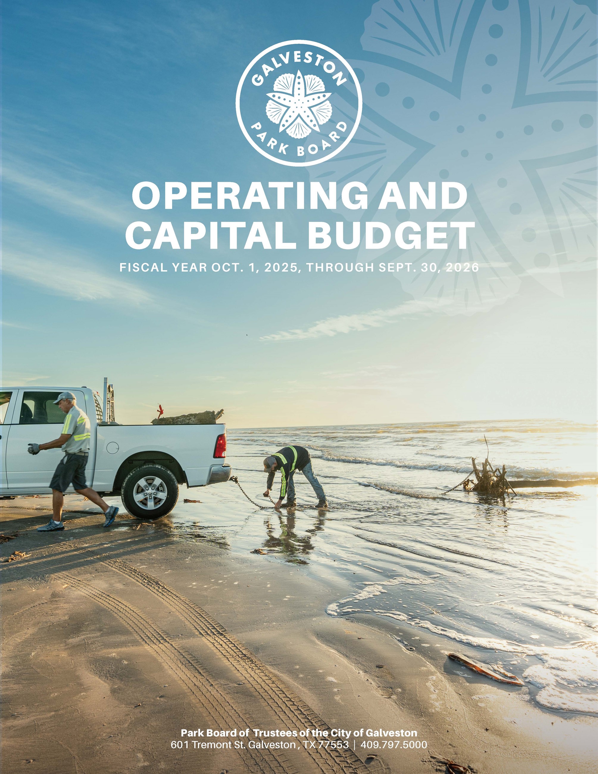 Photo of two men securing driftwood to the back of a truck that says Operating Budget 