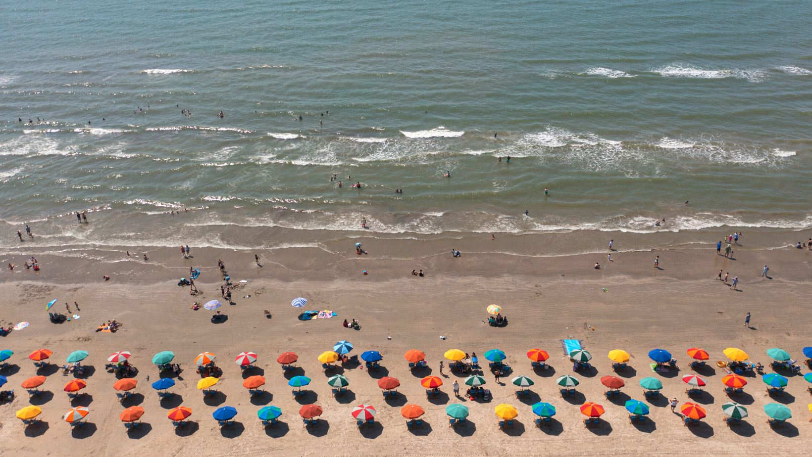 Chair and Umbrellas along the beachfront