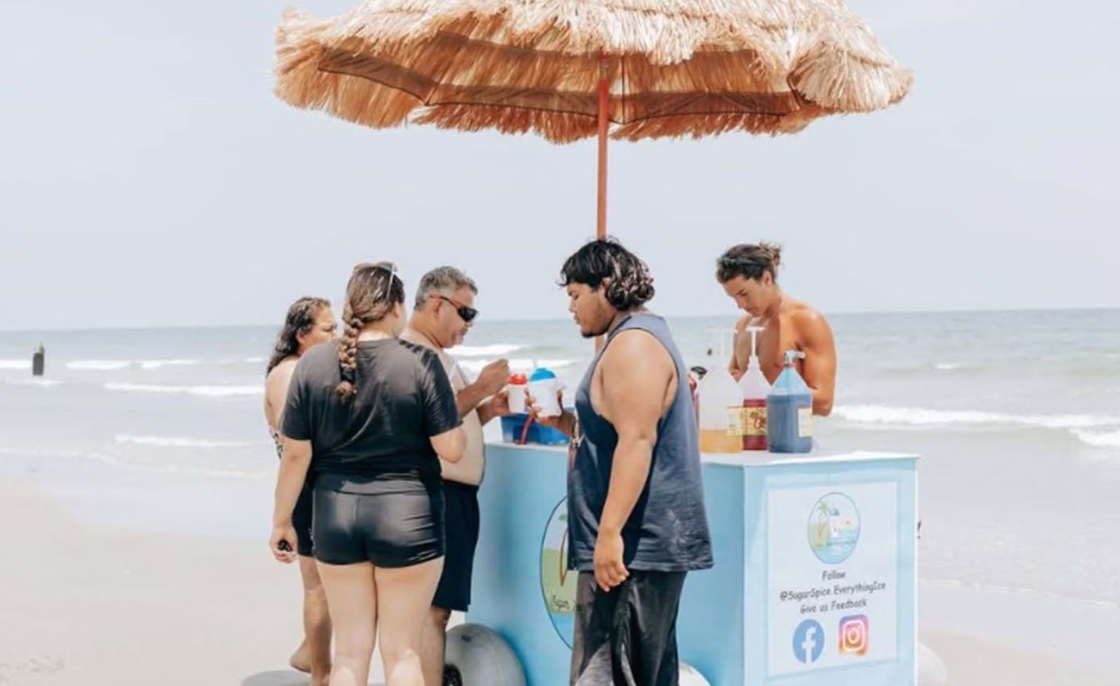 Sugar, Spice, Everything Ice serving snow cones